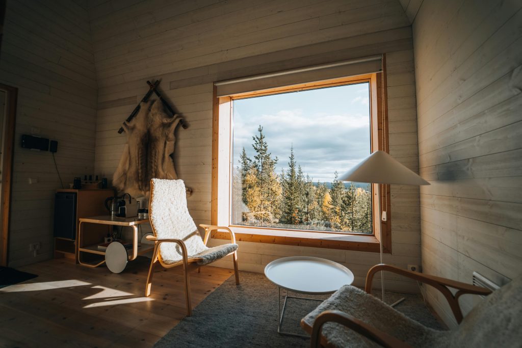 Room Interior with a View of Forest in Autumn